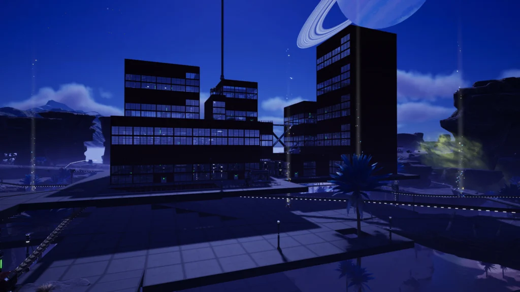 Screenshot from the game Satisfactory. The photo is a night time view of a "city" of factories on foundation platforms.
