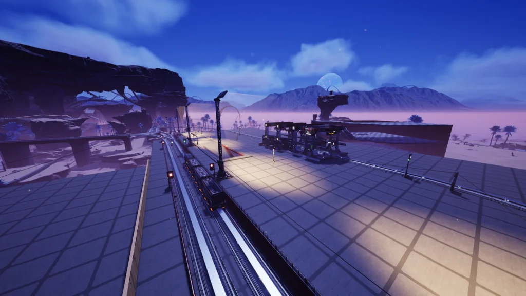 Screenshot from the game Satisfactory. Showing a large area covered with foundations, and a rail line running up through the centre of the image. In the background is a rail yard of sorts, and the half-dismantled building behind that.